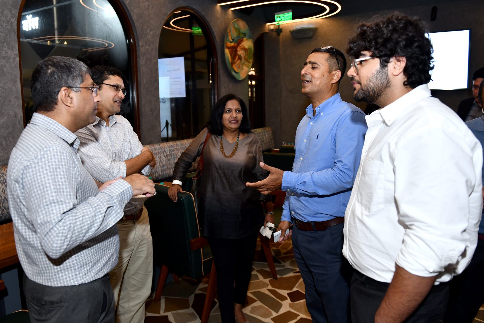 Guests in a group conversation