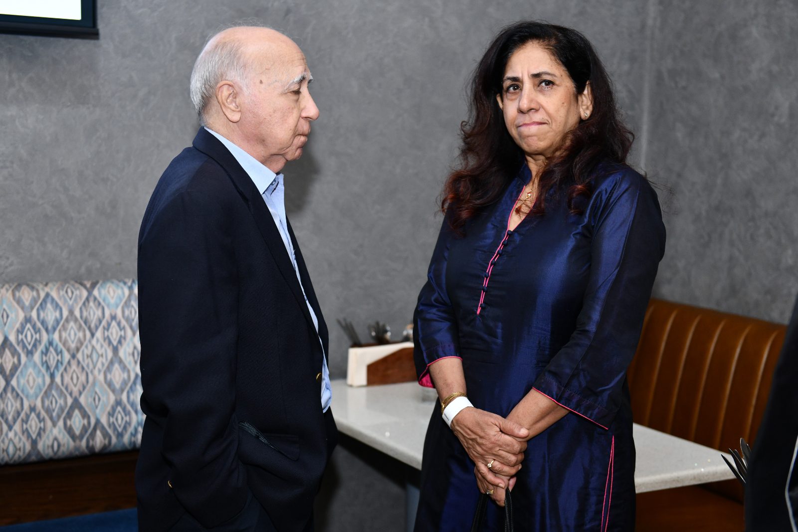 Two guests in conversation